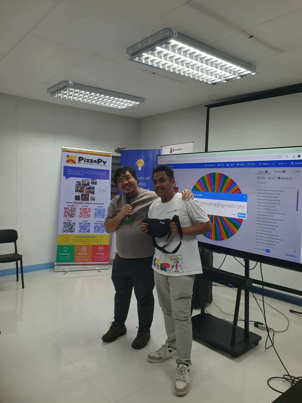 On stage at Cebu Hacktoberfest with PizzaPy